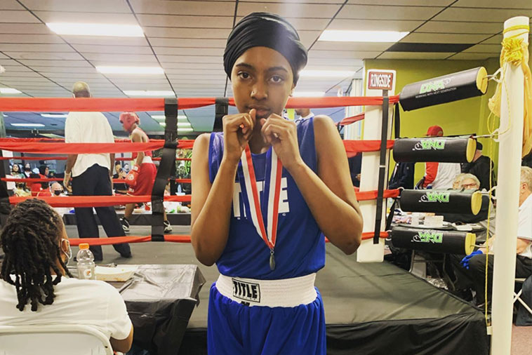 Boxer posing for camera in a guard position